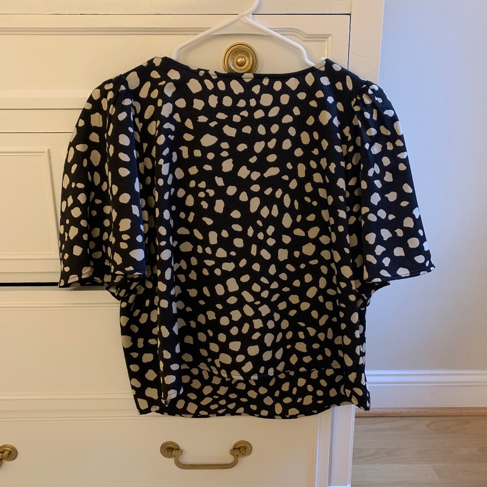 Cropped, open back blouse